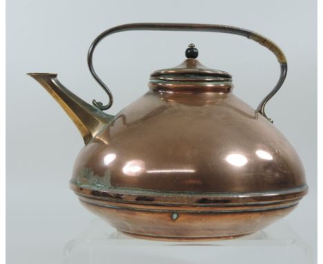 An Arts and Crafts copper kettle, by W A S Benson, of compressed circular shape, with a flattened handle, impressed trowel ma