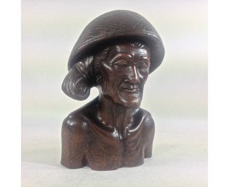 An Eastern carved hardwood portrait bust, 37cm tall