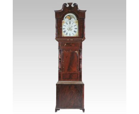 An early 19th century mahogany cased long case clock, of large proportions, with a swan neck pediment, the painted arched dia