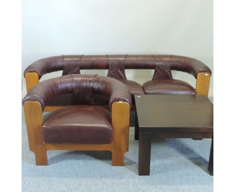 A 1970's red leather upholstered sofa, 193cm, together with a matching armchair and coffee table