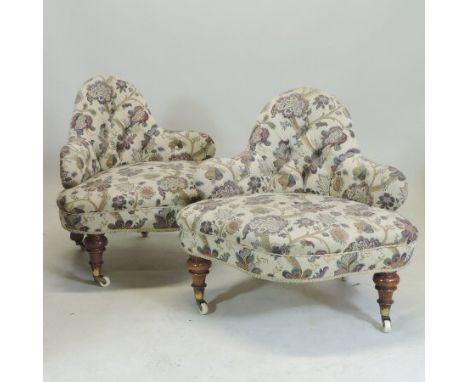 A pair of Victorian floral upholstered button back conversation chairs, on turned legs and castors