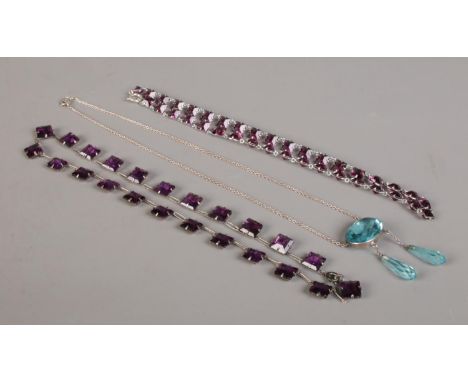 Three vintage paste necklets, to include amethyst coloured examples.  