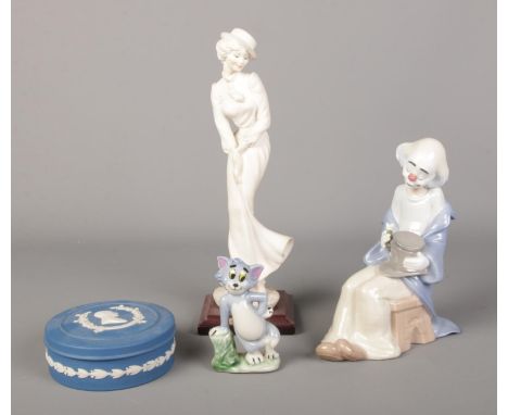 A small collection of ceramics, including Nao clown, Wedgwood jasperware trinket dish and Wade Tom figure.  