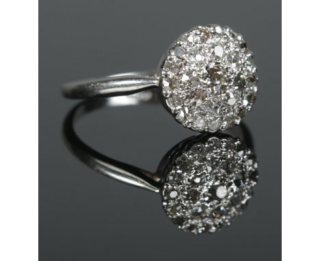 An 18ct White Gold Deco diamond cluster ring. Size R. Total weight: 3.51g  