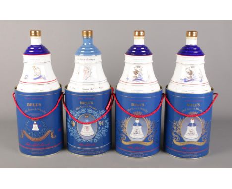 Four cased and sealed bottles of Bell's Old Scotch Whisky in Royal Decanters. To commemorate: The Birth of Princess Beatrice,