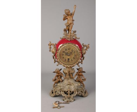 An antique mantel clock surmounted with spelter cherubs. The movement stamped Lenzkirch 1 million. Height 53cm.  Not running.