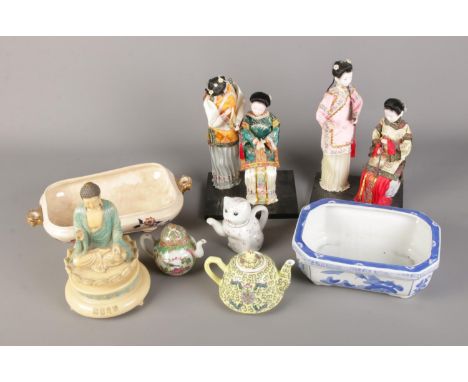 A box of assorted oriental ceramics including tea pots and bonsai planter along with pair of figures.  