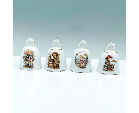 A set of 4 white bells with gold-colored trims that depict the art pieces of follow the leader, guiding angel, spring basket,