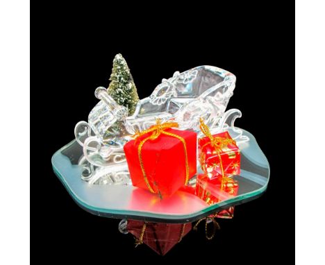 Clear crystal sleigh with tree and 2 presents. Swarovski backstamp. 7475000601. This item has its original box: 5.75""H x 6""