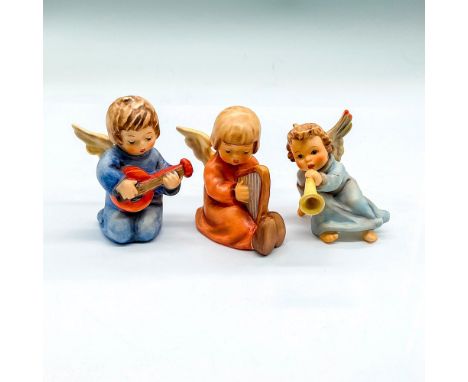 Includes an angel in blue tunic and banjo, The Accompanist, Goebel Germany backstamp. An angel with harp, Song of Praise, Goe