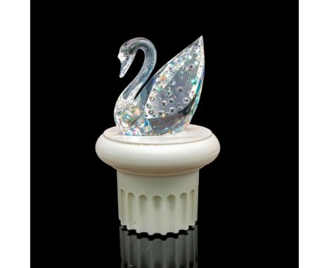 Iconic clear crystal figurine of the graceful Swarovski swan. Raised crystal bubbles on wings. Swarovski backstamp. 763310000