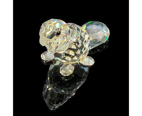 Faceted clear cut crystal, with black-colored beaded eyes. Swarovski backstamp. This item has its original box. Box measures 