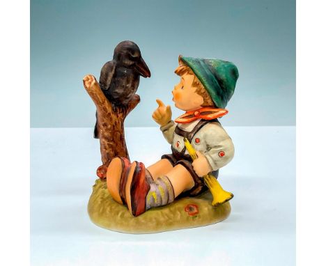 Goebel porcelain figurine of boy singing with black bird, Sing Along HUM433. Goebel backstamp. Dimensions: 3.75"L x 2.75"W x 