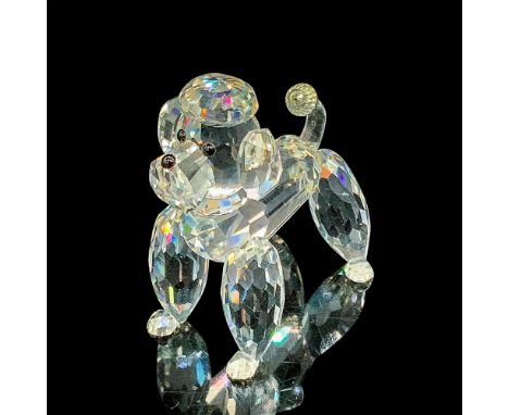 Faceted clear cut crystal, with black-colored beaded eyes. Swarovski backstamp. This item has its original box. Box measures 