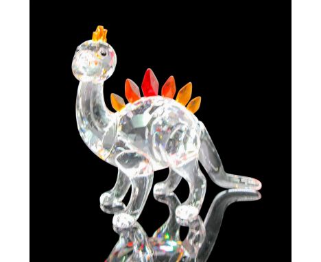 Clear crystal faceted body with black crystal eyes and orange crystal scales. Swarovski backstamp. This item has its original