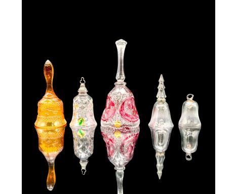 A set of 5 crystal and glass dining bells, two are clear with smooth bodies, one is a Waterford 12 Days of Christmas bell, on