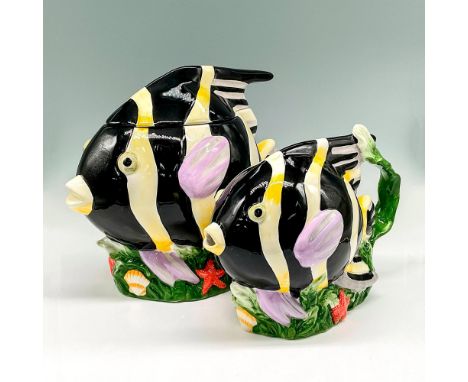 This brightly colored ceramic design of yellow and black fish with shell accents includes drink pitcher 10""L x 5""W x 7.5""H
