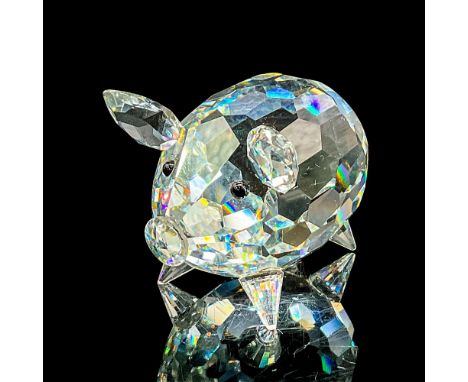 Clear faceted crystal figure of a cute little pig with black eyes. Swarovski mark. Retired, 7619 NR 000 008. This item has it