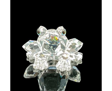 Part of the In The Secret Garden theme. Clear crystal body with green eyes. Swarovski markings. This item has its original bo