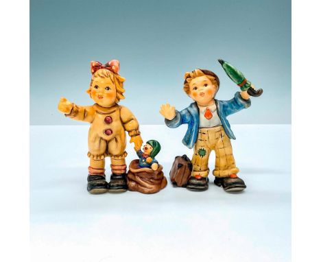 2 Hummel porcelain figures featuring a girl with her sack of toys called Looking Around HUM2089/A and boy in Circus were hitc