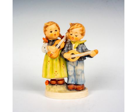 Hand painted porcelain figure. Young boy and girl playing guitar and banjo. HUM 150 2/0. Goebel backstamp. Artist: M.I. Humme