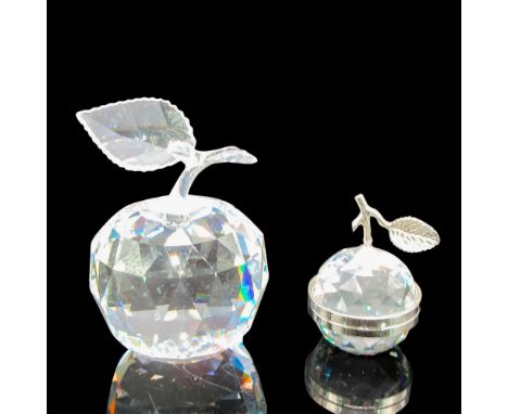 Clear faceted figural with notched leaf and smooth stem. 7476000001. Round faceted box with rhodium closure and leaf design o