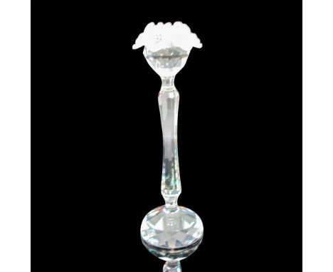 Tall, clear stemmed crystal holder with round base and frosted floral top. Swarovski backstamp. This item has its original bo