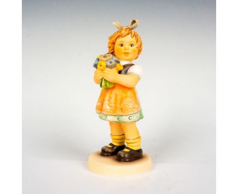 Hand painted porcelain figure. Girl holding bouquet of flowers. Goebel backstamp. Artist: M.I. HummelIssued: 2009Dimensions: 