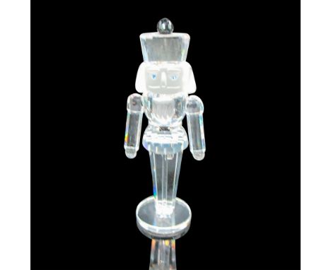 Part of the Exquisite Accents collection. Clear crystal figural, standing to attention with blue crystal eyes, frosted face, 