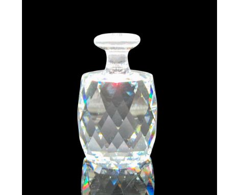 Clear faceted body with clear stemmed top. Swarovski backstamp. 7459065000. This item has its original box: 5""H x 3.25""dia.