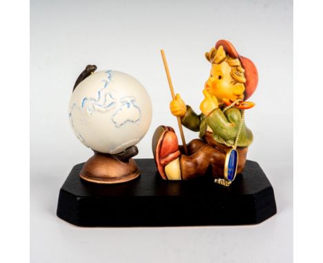 Hand painted charming set first released in 1999, features a young boy seated with stick in hand, a moveable globe, and both 