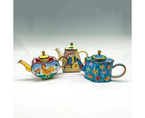 Includes in this set of enamel over metal miniatures some whimsical design of Chicken with flowers #481, ocean scene with tro