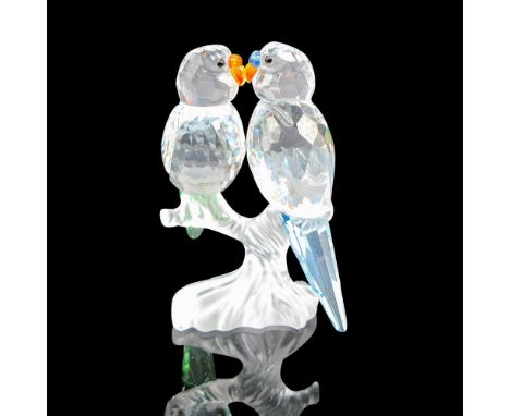Clear crystal faceted body on satin branch base. Figurines have black crystal eyes with orange beak. Swarovski backstamp. 680