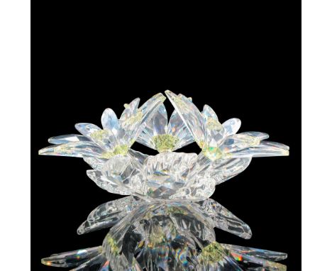 Beautiful crystal sunflower centerpiece has yellow crystal centers with clear leaves on base. Swarovski backstamp. 7478OOOOO4