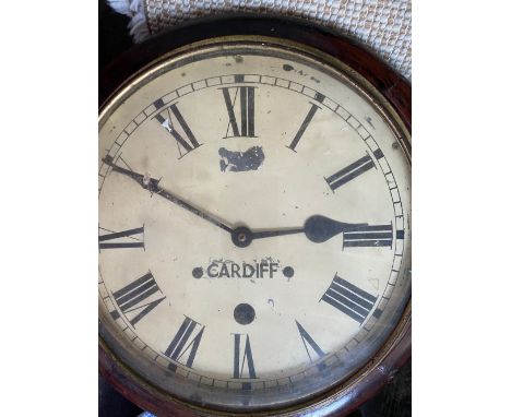 C19th wall clock, with white Roman dial marked Cardiff in brass bezel, now with quartz movement , D35cm,a brass oil lamp conv