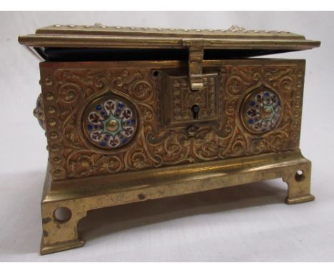 Victorian gilt brass rectangular jewellery casket, all over relief decorated with scrollwork and coloured enamel cabachon, on