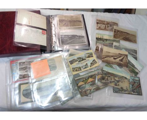 A box sleeved red ring bound album containing a collection of early 20th Century and other Teignmouth interest postcards, mai