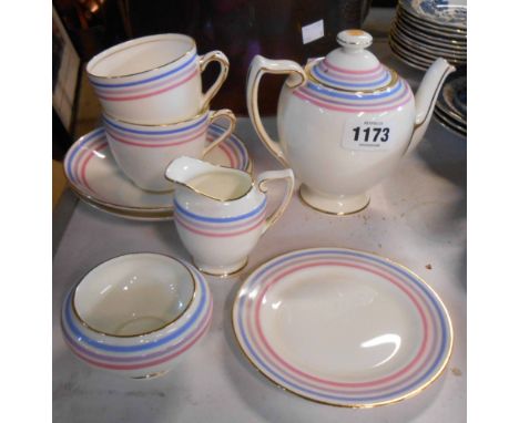 An Art Deco Royal Doulton bone china tea for two set with banded decoration comprising teapot, milk jug, sugar bowl, two cups