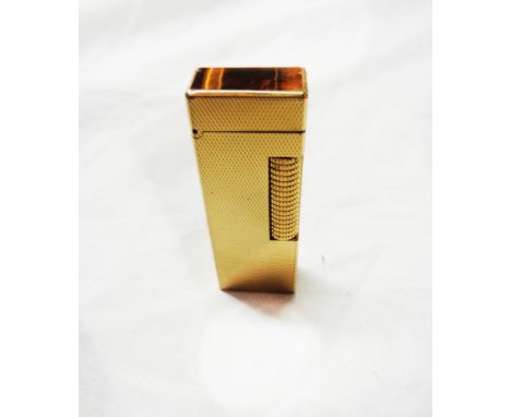 A vintage Dunhill Rollagas gold plated lighter with inset tiger's-eye top