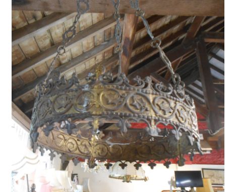An antique brass hanging lamp of the Gothic style with ivy leaf frieze decoration