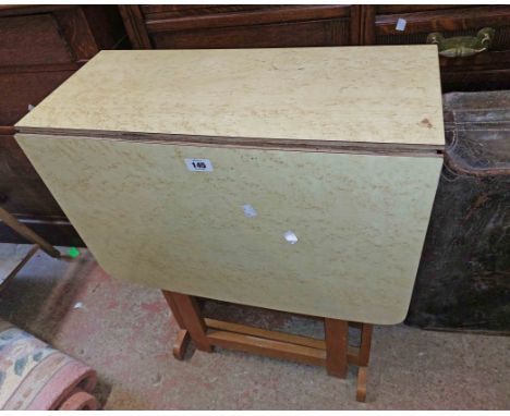 A 60cm vintage mixed wood and Formica topped gateleg table