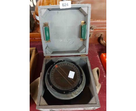 A cased WWII military compass