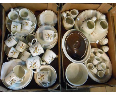 Two boxes containing a quantity of Royal Doulton tableware, decorated in the Wild Country pattern including storage jars, tur