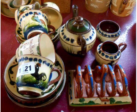 A small quantity of Torquay Pottery including Longpark cockerel decorated teapot, cream and sugar, similarly decorated cups a