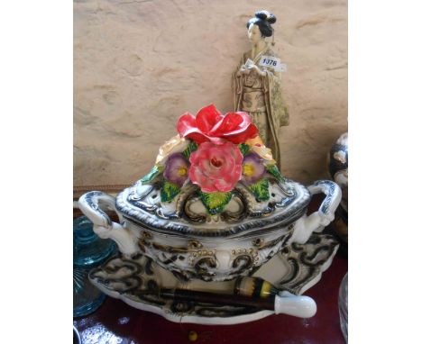 A large Japanese resin figure, depicting a lady holding a box - sold with an old ceramic pipe and a large pottery lidded ture