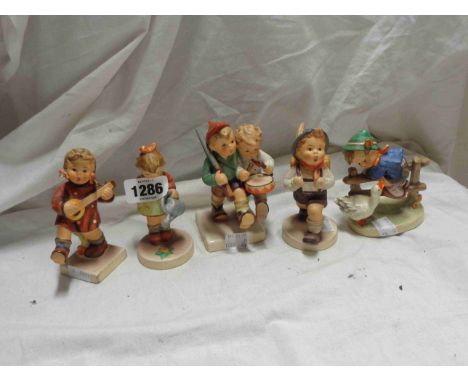 Five Hummel figurines