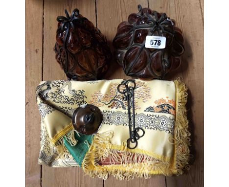 Two decorative coloured glass and metal bound light shades - sold with an embroidered Chinese tablecloth