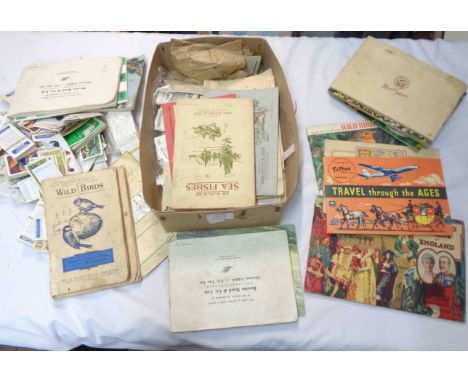 A box containing a collection of loose vintage cigarette cards including large format Wills' Butterflies &amp; Moths, also nu