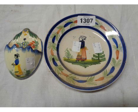 A Quimper pottery plate with typical painted decoration - sold with a small wall pocket (a/f)