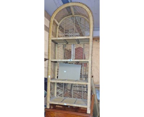 A 51cm modern cane bound dome-top four shelf open bookcase